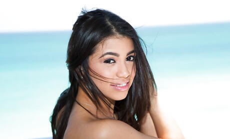 Foxy venezuelan dark-haired Veronica Rodriguez uncovering tiny tits and hairy twat outdoor